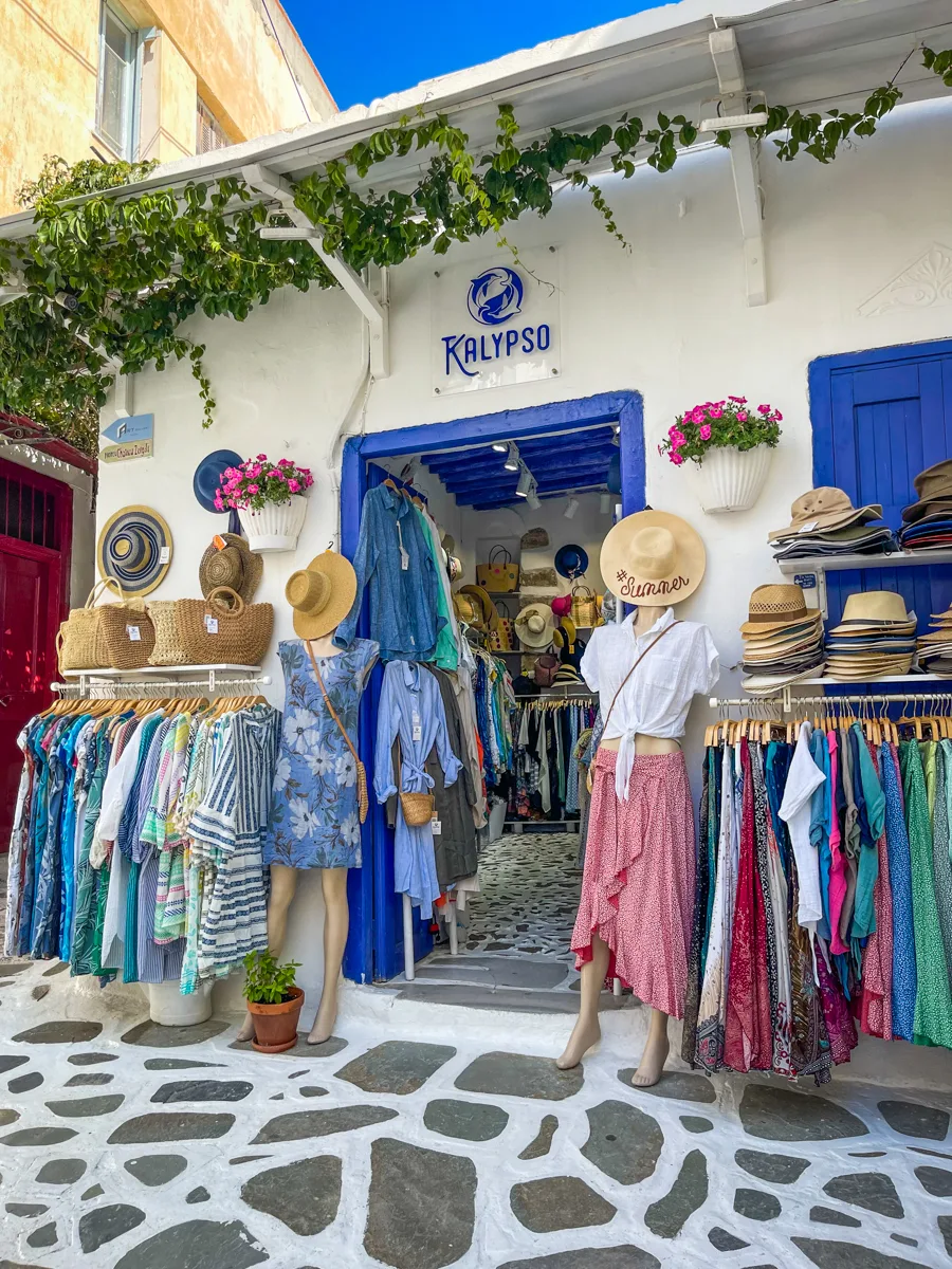 shops on a greek island with clothing outisde