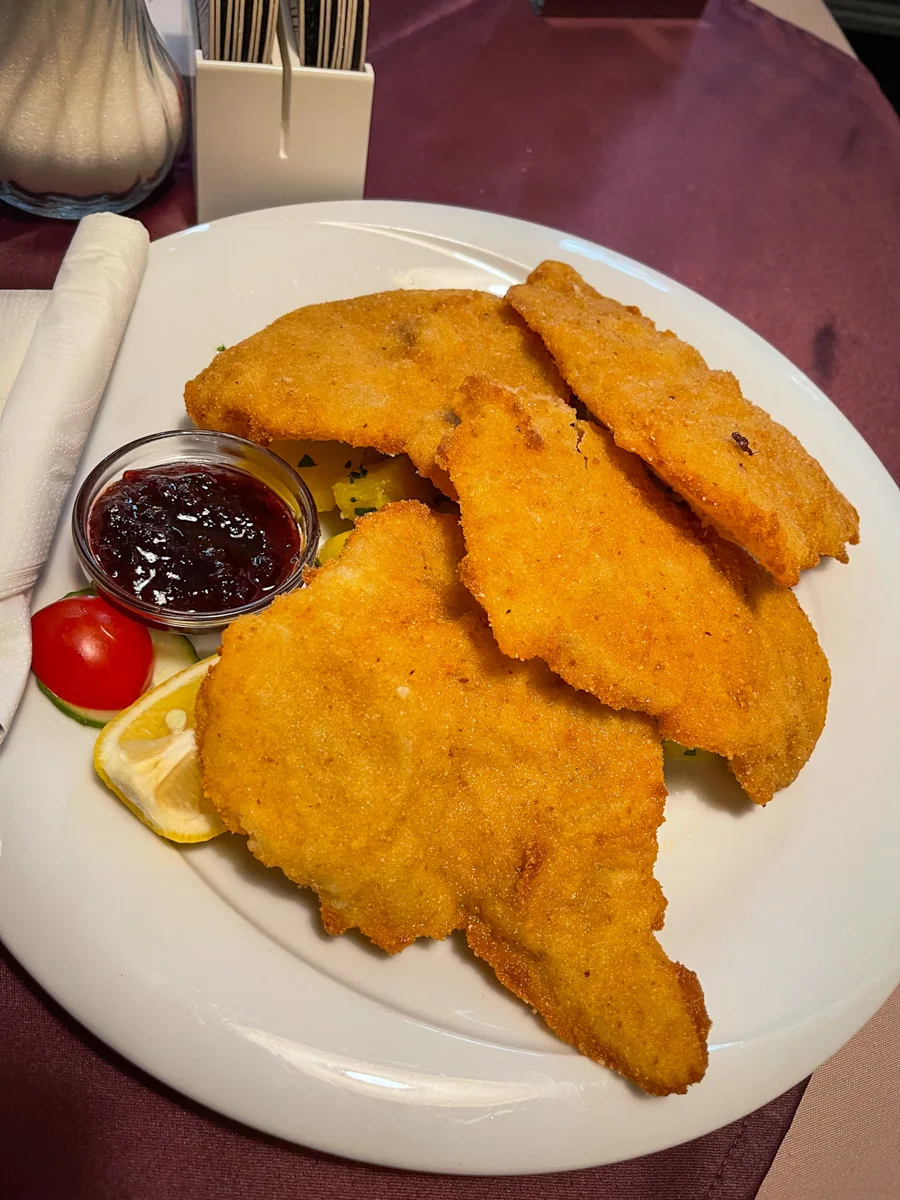 schnitzel with sides at the best restaurant in vienna