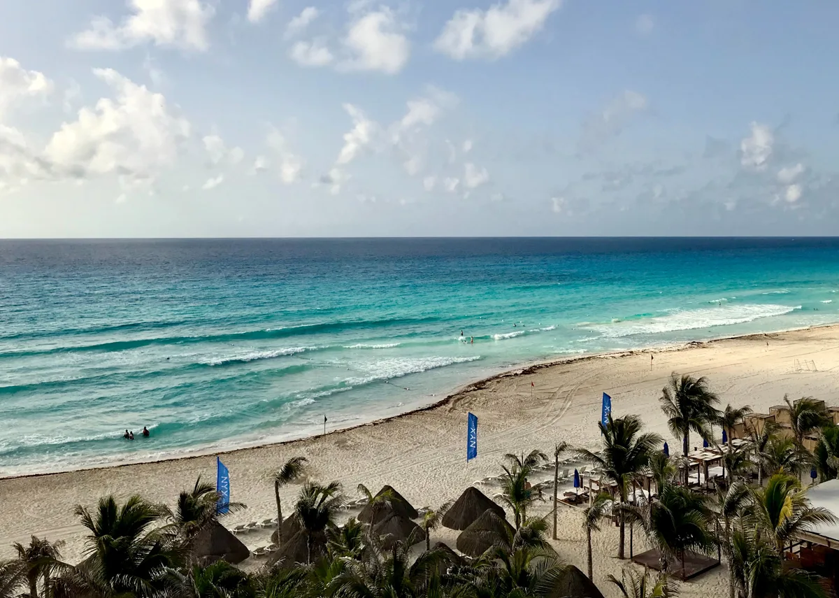 turquoise waters in cancun with calm and quiet beaches - waking up early means it doesn't really matter when the best time to visit cancun is because the beaches are always quiet at dawn.