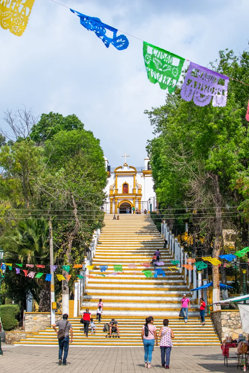 stairs leading up to a church in san cristobal de las casas which is one of the pueblos mágicos in chiapas.