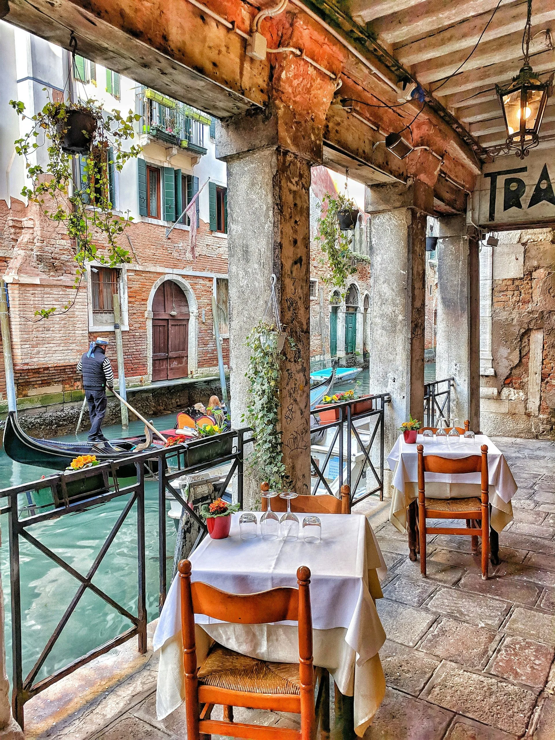 restaurant next to a canal in Venice.