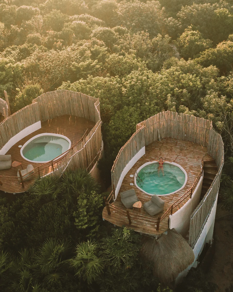 swimming pools on top of hotels in the middle of the jungle.