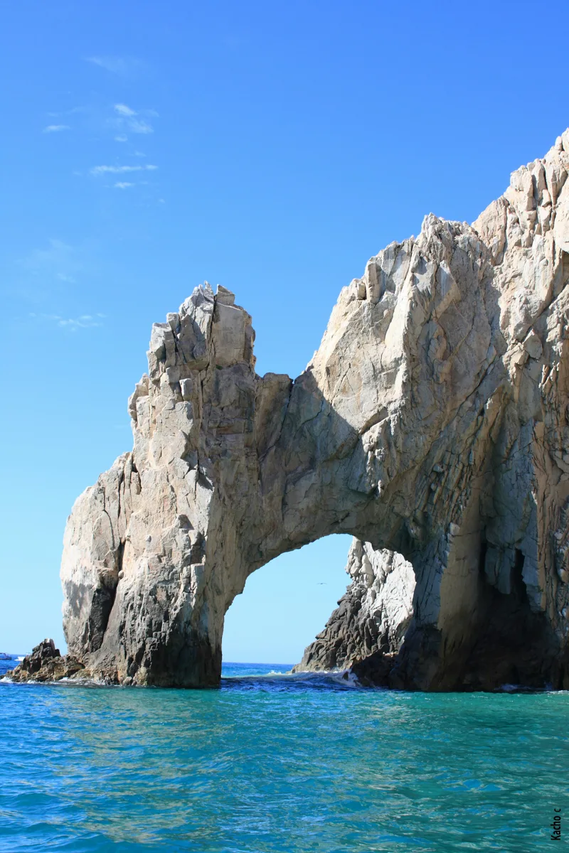 el arco in cabo san lucas, an arch created by coastal erosion with water on all sides.