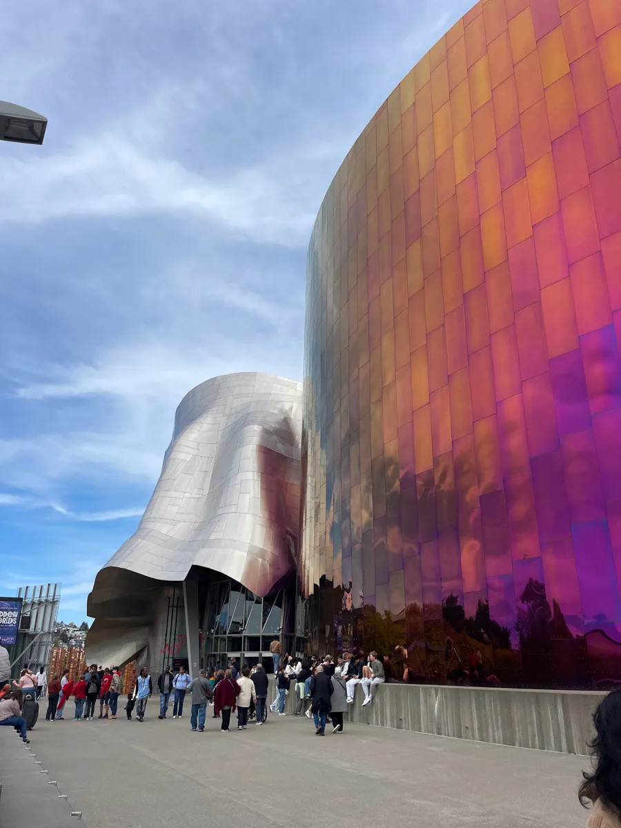 front of the museum of pop culture with a pink metalic side and then a totally silver metallic side.